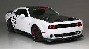 What are ur favorite type of car these are mine demon and hellcat