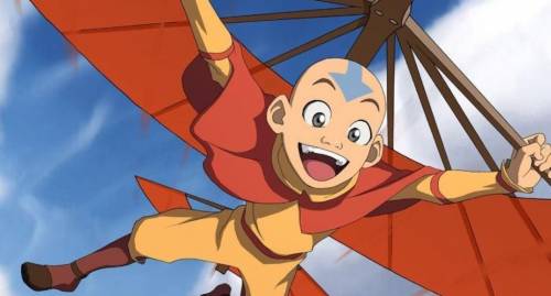 Below is a picture of Aang, the Last Air bender. Based on his arrow and his clothes, what color har