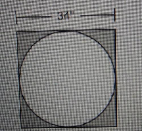 Circle is cut from a square piece of cloth as shown:

how many square inches of cloth are cut from
